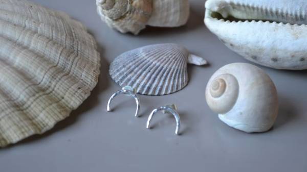 - a , silver Jewellery by Katie Greaves, measuring 1 x 1 cm (H x W) £20